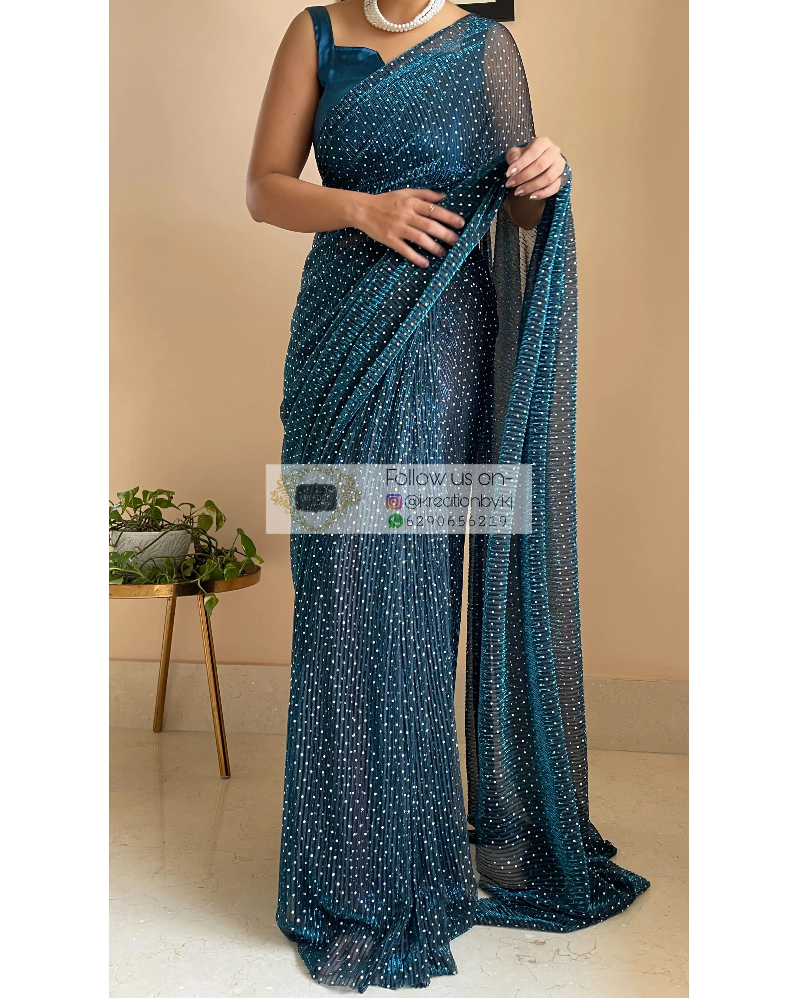 Blue Pleated Shimmer Net Saree