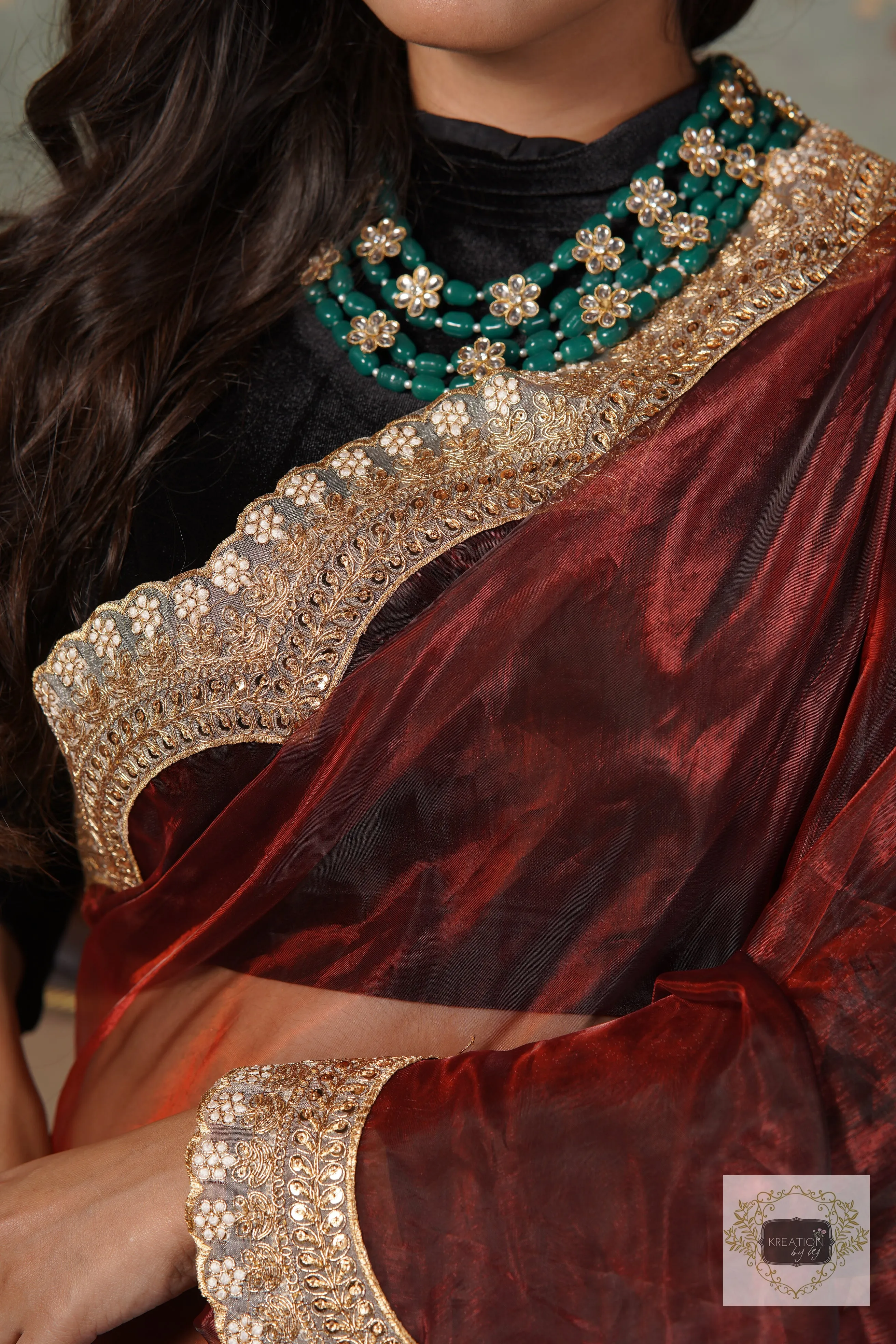 Maroon Glass Tissue with Golden  Border Saree