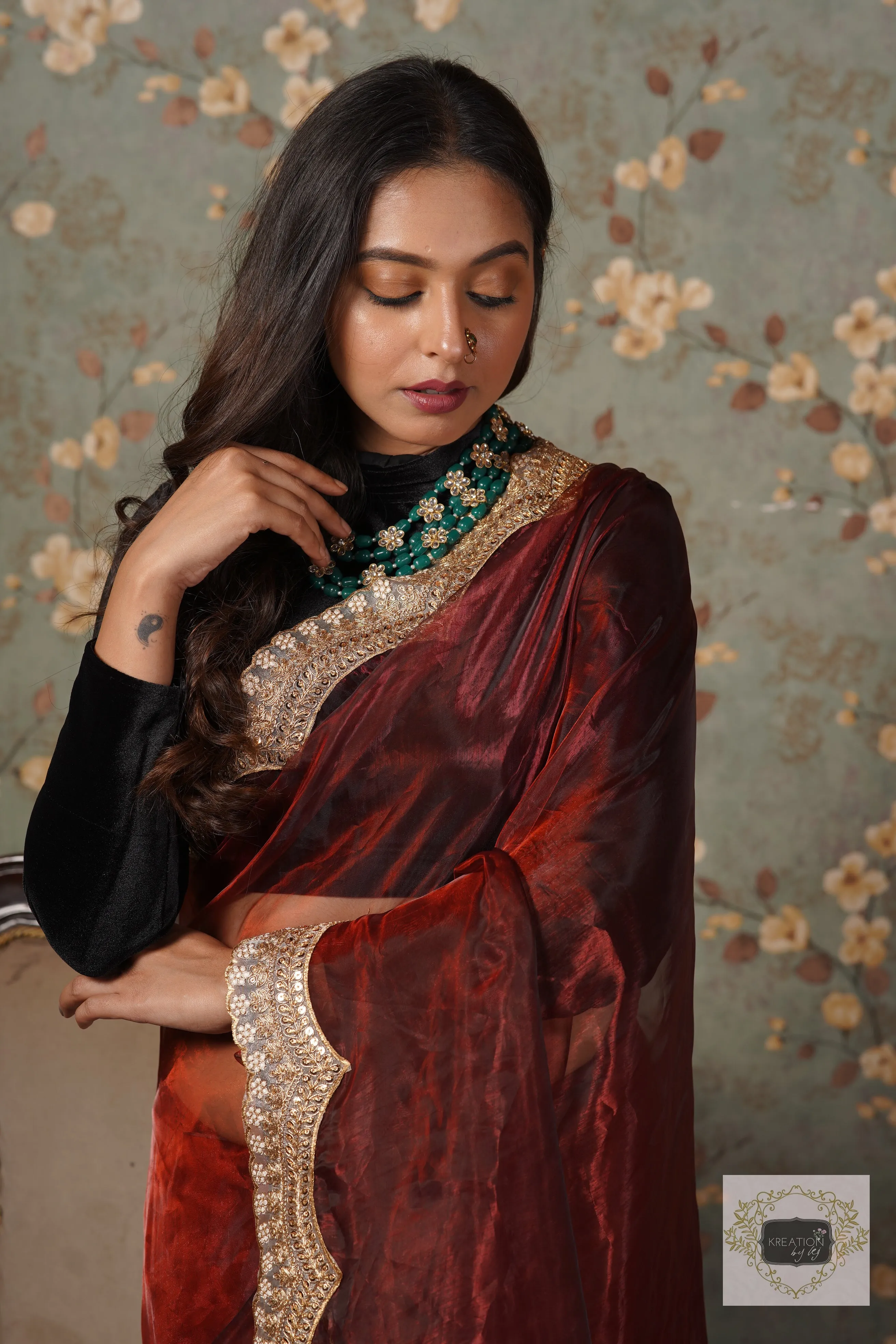 Maroon Glass Tissue with Golden  Border Saree